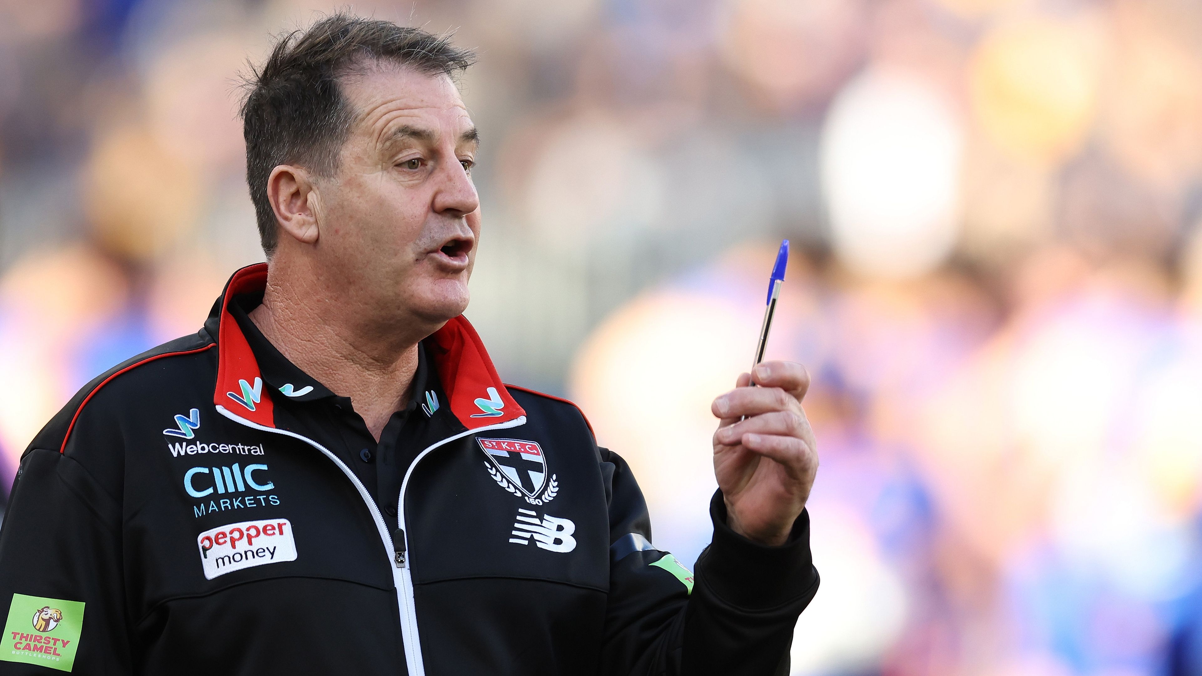 PERTH, AUSTRALIA - JULY 02: Ross Lyon, Senior Coach of the Saints addresses the team at the quarter time break during the 2023 AFL Round 16 match between the West Coast Eagles and the St Kilda Saints at Optus Stadium on July 2, 2023 in Perth, Australia. (Photo by Will Russell/AFL Photos via Getty Images)