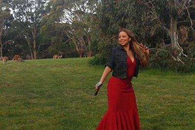 Mariah Carey has arrived on our Aussie shores and she's already hugged a koala, danced in a field of wild kangaroos and enjoyed dinner with a certain Australian act, Nathaniel. Check out her photo album...<br/>