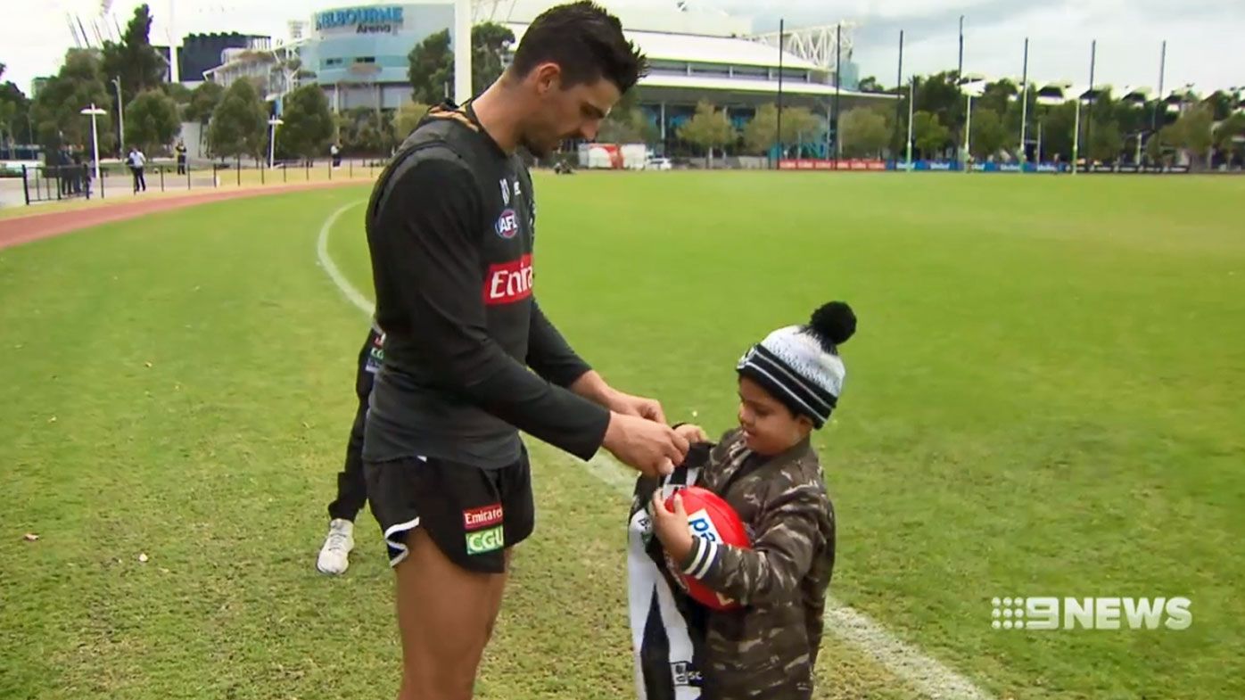 Collingwood players meet Kyron