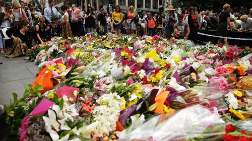 Mourners create of sea of colour in Sydney's Martin Place. (Getty)