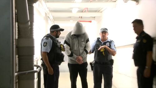 AFP officers escorted the man on a flight from Belgrade to Sydney, landing late last night.