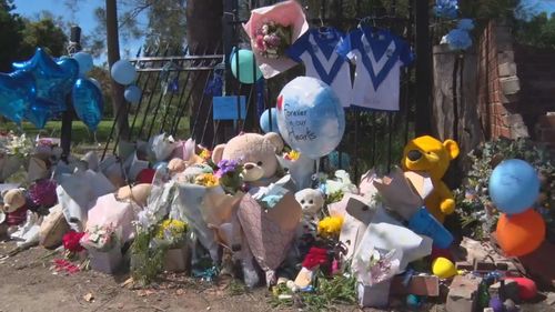 Gifts and balloons have been left at the crash site in Wellington, NSW.