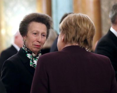 Princess Anne speaking with German chancellor Angela Merkel at the NATO summit.