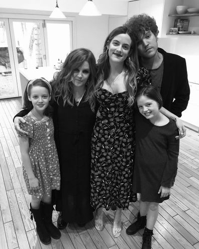 Lisa Marie Presley surrounded by her children.