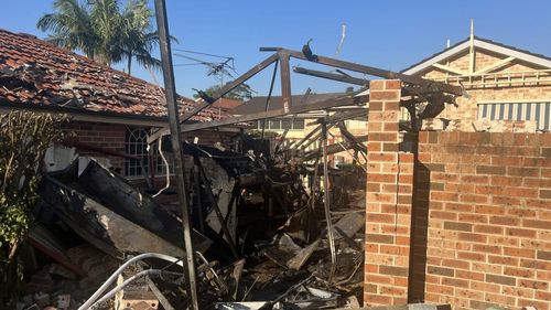 An explosion destroyed a garage in East Hills, Sydney.