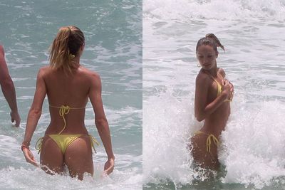 The gorgeous Victoria's Secret model hit up South Beach in Miami for some fun in the sun, frolicking in the surf in nothing but an itsy-bitsy yellow bikini.<br/>
