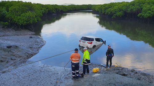 Posting photos of the 2000kg catch online, Queensland's Department of Transport and Main Roads said the car, a brand-new Isuzu MUX was retrieved from McCreadys' Creek last month. 