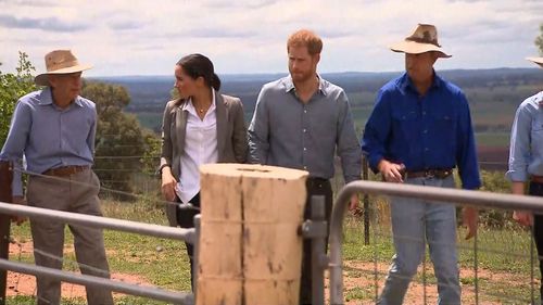 The Duke and Duchess of Sussex touring the Woodley family farm.