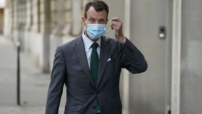 Denmark's Prince Joachim adjusts his face mask as he walks to work, at the Danish Embassy in Paris, France on Friday, September 18, 2020