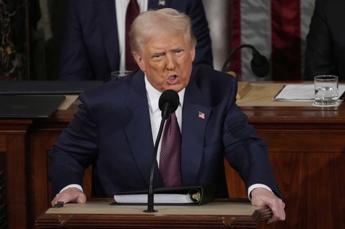 A Senator has been removed from as President Donald Trump begun his address to Congress and the American people, laying out his plans for the months ahead.
