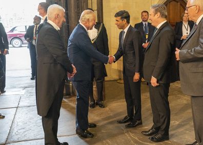 King Charles III meets UK Prime Minister Rishi Sunak (centre), Labour leader Sir Keir Starmer (right) and The Speaker of the House of Commons, The Rt Hon Sir Lindsay Hoyle (left) as the King and the Queen Consort attend Westminster Hall Reception at Westminster Hall on May 2, 2023 in London 