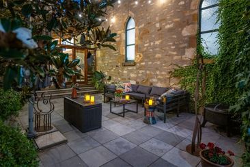 restored 1860&#x27;s chapel and cemetery for sale operating as luxury airbnb domain 