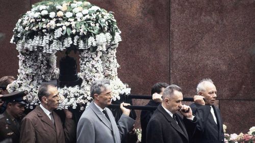 Yuri Gagarin's remains are carried by Soviet leaders as part of his funeral procession in Moscow.