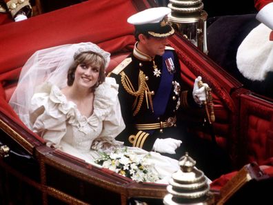 Princess DIana and Prince Charles during their wedding day carriage ride, 1981