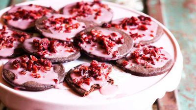 Choc wafer cookies with rose icing and cranberries