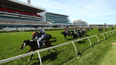 Jye McNeil riding #6 Twilight Payment wins the Melbourne Cup.