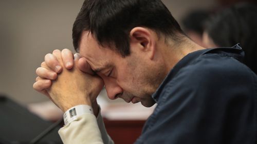Larry Nassar listens to victim impact statements prior to being sentenced. (Getty)