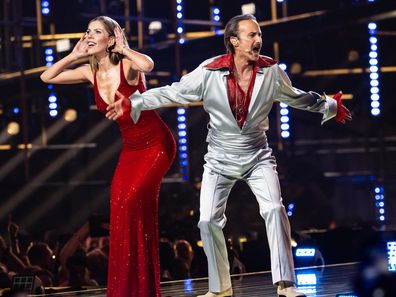 VIENNA, AUSTRIA - MAY 11: Victoria Swarovski and Michael Ostrowski speak onstage during the second dress rehearsal for the semi-final 1 of the 2026 Eurovision Song Contest at Wiener Stadthalle on May 11, 2026 in Vienna, Austria.  (Photo by Christian Bruna/Getty Images)
