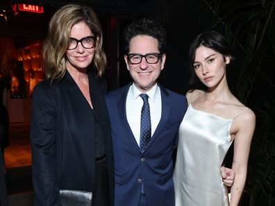 LOS ANGELES, CALIFORNIA - MARCH 13: (L-R) Katie McGrath, J.J. Abrams and Gracie Abrams attend the CAA pre-Oscar party at Living Room on March 13, 2026 in Los Angeles, California.  (Photo by Randy Shropshire/Getty Images for Creative Artists Agency, LLC)