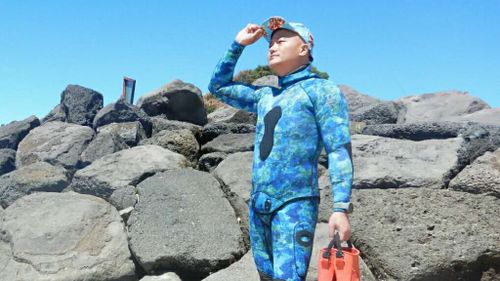 Marshall Yu, 43, is an interior designer from Shanghai who enjoys diving as a "hobby". (supplied)