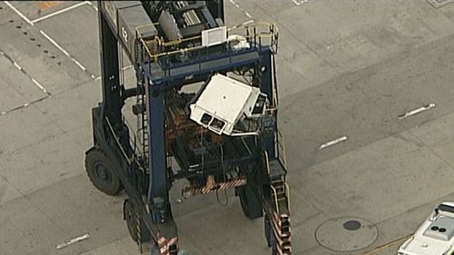 The woman fell from an industrial vehicle. (9NEWS)