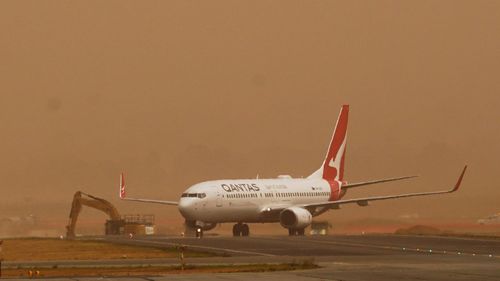 Passengers should check with their airline before heading to the airport, which remains open to help with firefighting operations, a spokeswoman told 9news.com.au.

