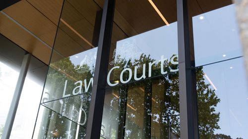 Any link between the police officer's PTSD and the crime is tenuous, a judge says.