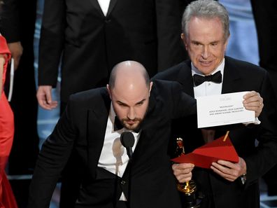  'La La Land' producer Jordan Horowitz holds up the winner card reading actual Best Picture winner 'Moonlight' onstage during the 89th Annual Academy Awards at Hollywood & Highland Center on February 26, 2017 in Hollywood, California. 