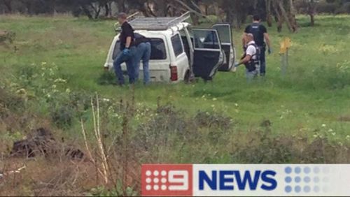 Prison escapee caught after car bogged