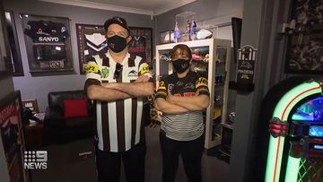 Penrith Panthers superfans celebrating at home