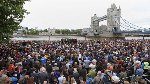 Huge crowds came together today to mourn the seven victims. (AAP)