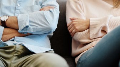 Cropped shot of a couple having a disagreement at home