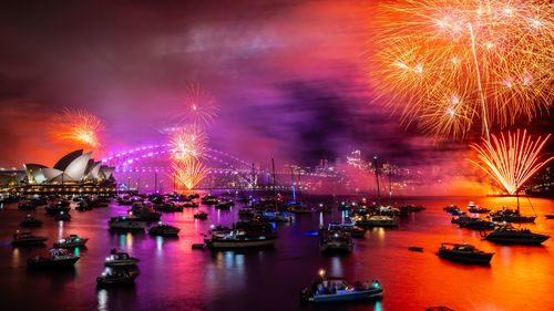 The midnight New Year's Eve fireworks on Sydney Harbour, viewed from Mrs Macquaries Chair. 31 December 2024. Photo: Wolter Peeters, The Sydney Morning Herald.