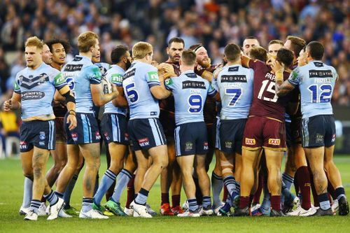 The series opener was as tight as State of Origin games that had come before - with all the scuffles, big hits and runs included. Picture: AAP.