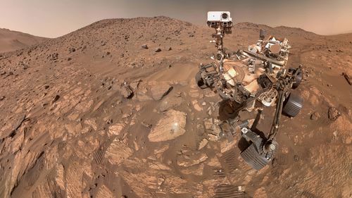 NASA's Mars rover Perseverance has uncovered rocks in a dry river channel that may hold potential signs of ancient microscopic life, scientists reported on Wednesday.