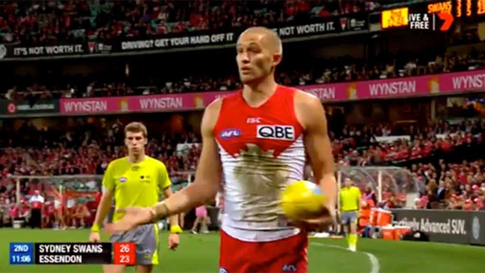 AFL: Commentary team shocked by failure to call out of bounds kick