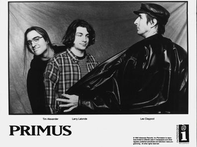  Tim Alexander, Larry Lalonde, Les Claypool. January 1, 1994. (Photo by Interscope Records).