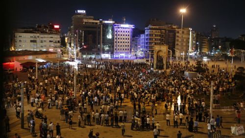 Supporters of Turkey's President Recep Tayyip Erdogan, gather in Istanbul's Taksim square. (AP)