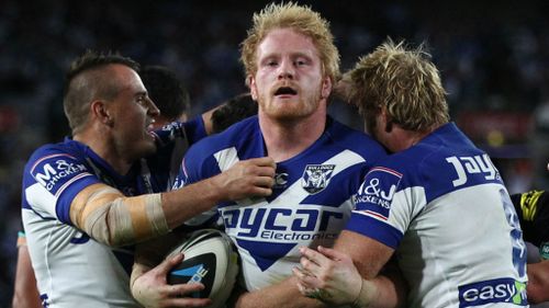 James Graham of the Bulldogs celebrates after scoring a try in the final against the Panthers. (AAP)