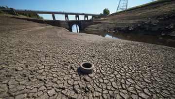 Low water levels at Baitings Reservoir reveal an ancient pack horse bridge as drought conditions continue in the heatwave on August 12, 2022 in Ripponden, United Kingdom. 