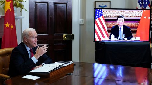 President Joe Biden meets virtually with Chinese President Xi Jinping