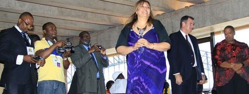 The author pictured receiving an award from Celebrate African Australians. Picture: Supplied