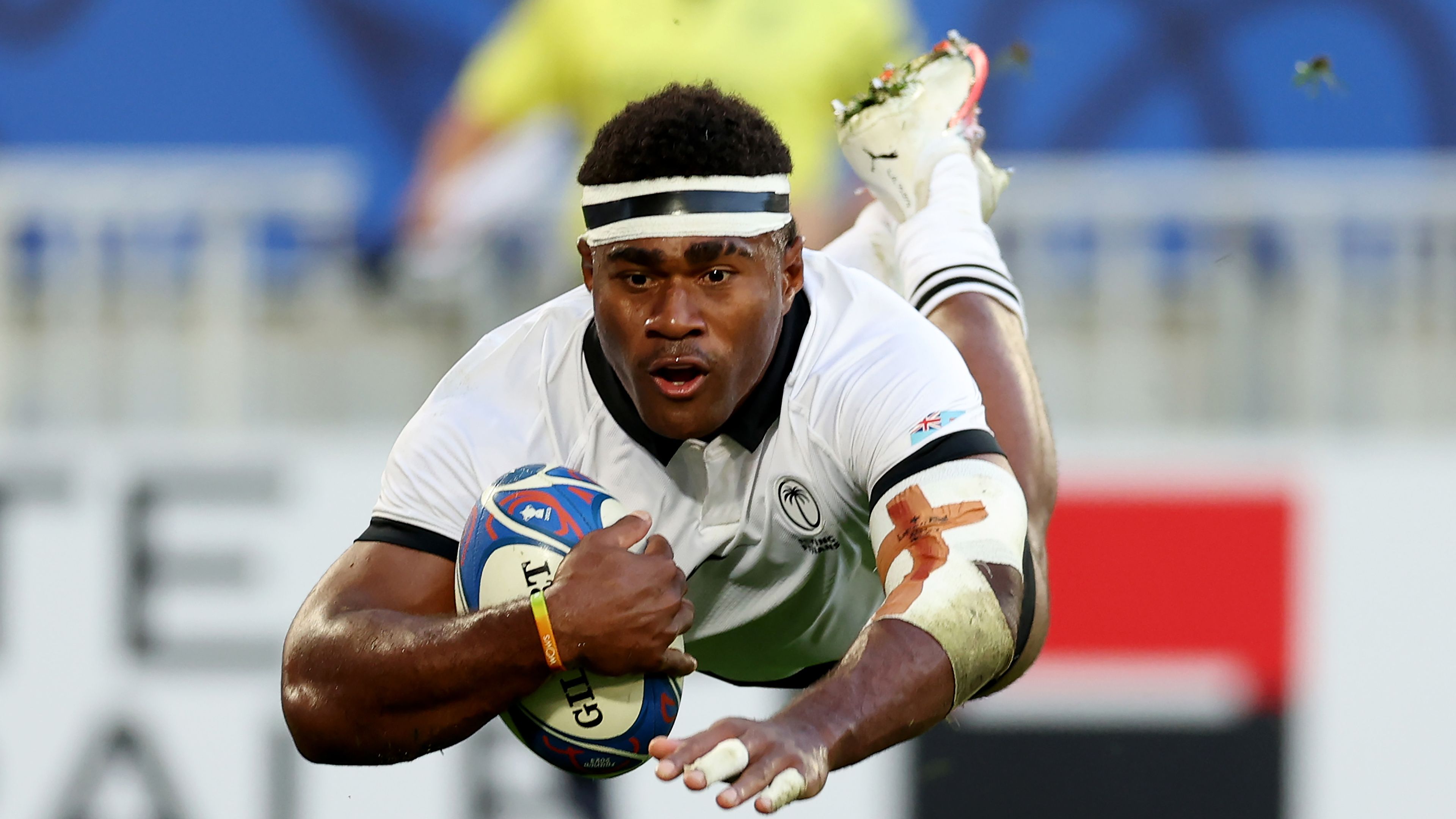Vinaya Habosi of Fiji scores his team&#x27;s second try during the Rugby World Cup match.