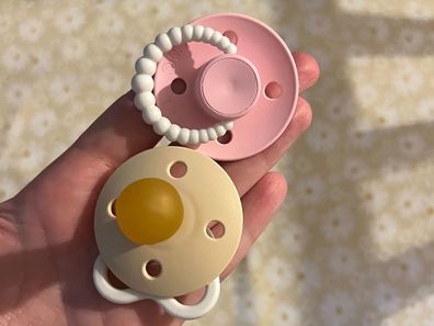 Mum Amy says using glow in the dark dummies has saved everyones sleep