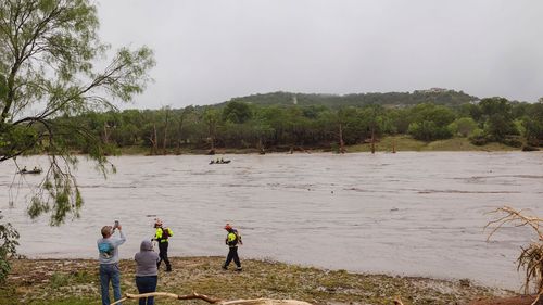 A Texas DPS helicopter conducts arial searches along the Guadalupe River in Kerrville on July 4.