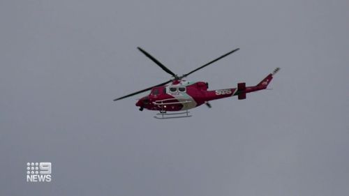 Rescue helicopters were monitoring the waters from above. 