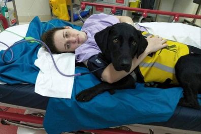 Dani in hospital seeking treatment after suffering injuries from her uncontrollable seizures. Baloo always by her side.