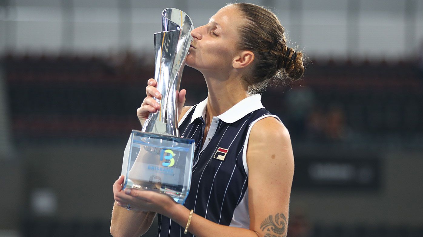  Karolina Pliskova of The Czech Republic kisses the winners trophy after the finals match against Madison Keys