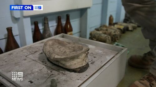 A WWII sailor's hat has been discovered beneath a Brisbane train station's ticket office, and returned to the sailor's family after 70 years.