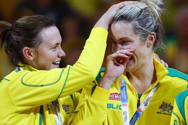 Natalie Butler (right) wells up with emotion after the 2015 Netball World Cup gold medal match between Australia and New Zealand.